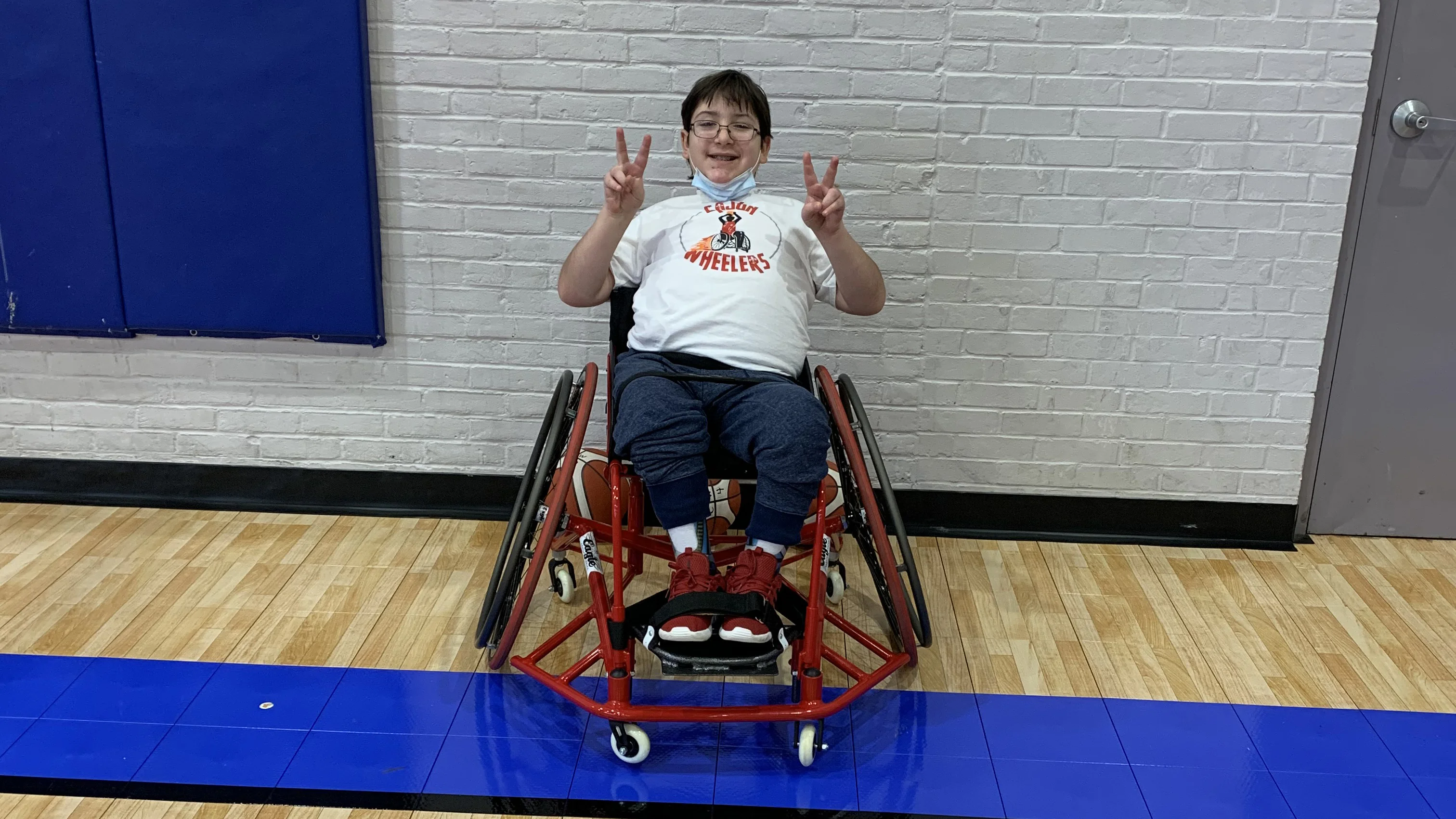 a boy sitting in a chair